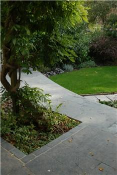 Curved terrace of black limestone